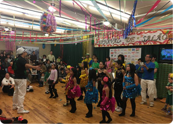 Photo from a research trip: Portuguese school children in Kobe perform samba during a Carnival celebration at the Kobe Migration Museum and Cultural Center.